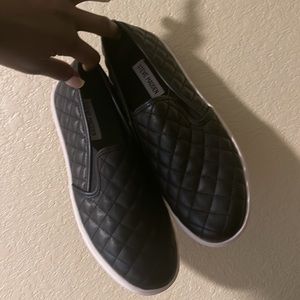 Black Steve Madden slip on shoe
